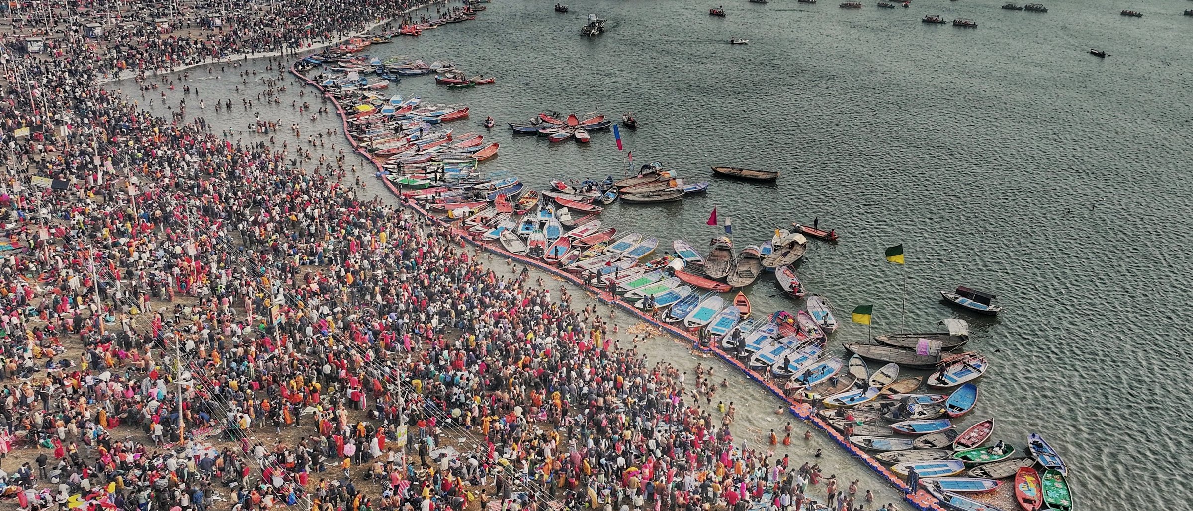 The crowds and boats at the Kumbh, seen from above